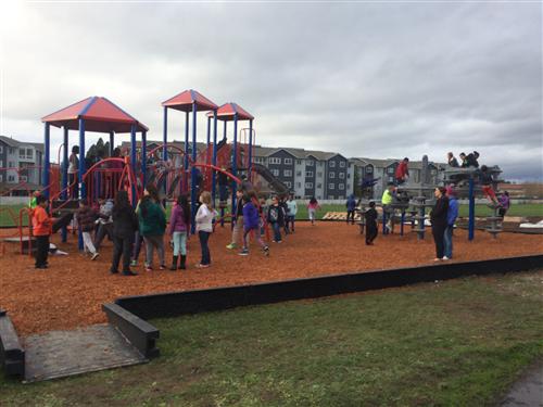 Students on new playground Students on new playground